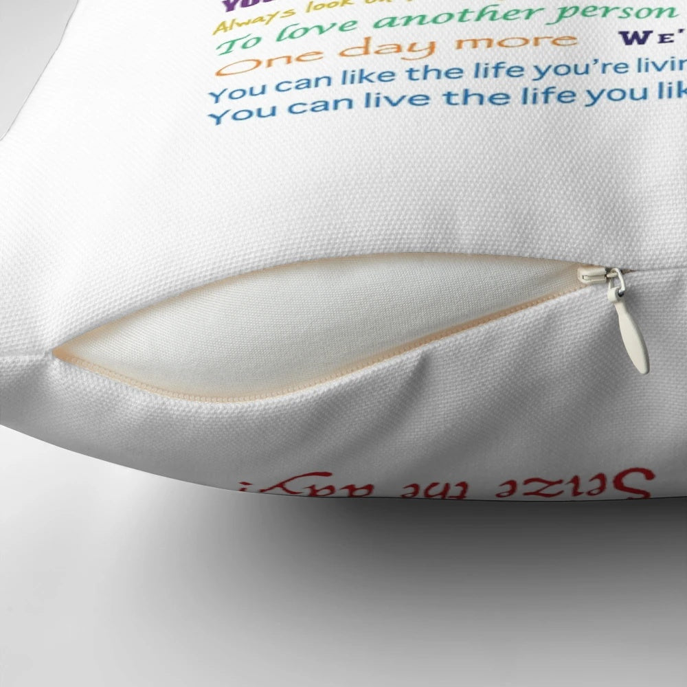 A throw pillow featuring an inspirational quote about lessons learned from musicals
