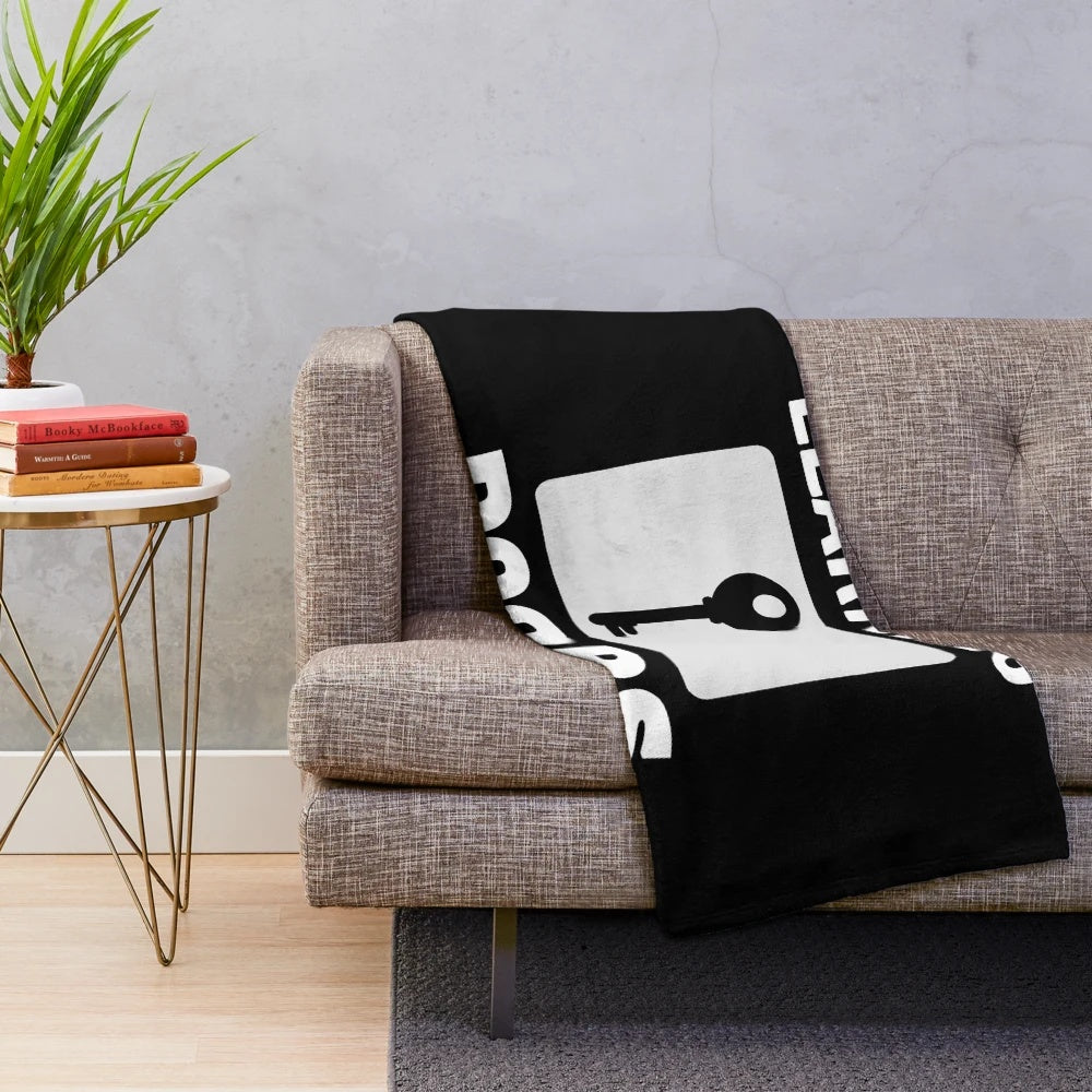 Cozy plush blanket with text "Learning Opens Doors - Teachers Make All Jobs Possible