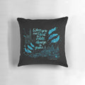 A decorative pillow featuring a quote from the book "Six of Crows" by Leigh Bardugo, with watercolor typography art.