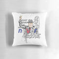 A decorative throw pillow featuring an illustration of Winston Churchill with the inspiring quote "Never Give In".