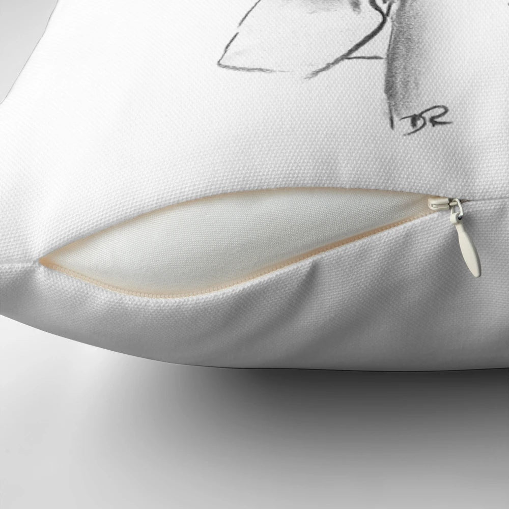 A decorative throw pillow featuring an illustration of Winston Churchill with the inspiring quote "Never Give In".