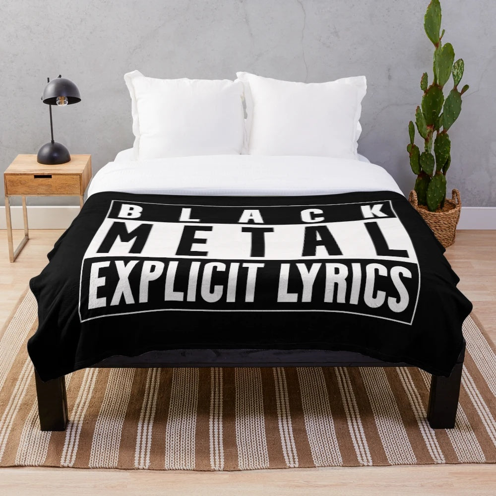 Heavy metal-themed plush blanket with guitar and dark imagery