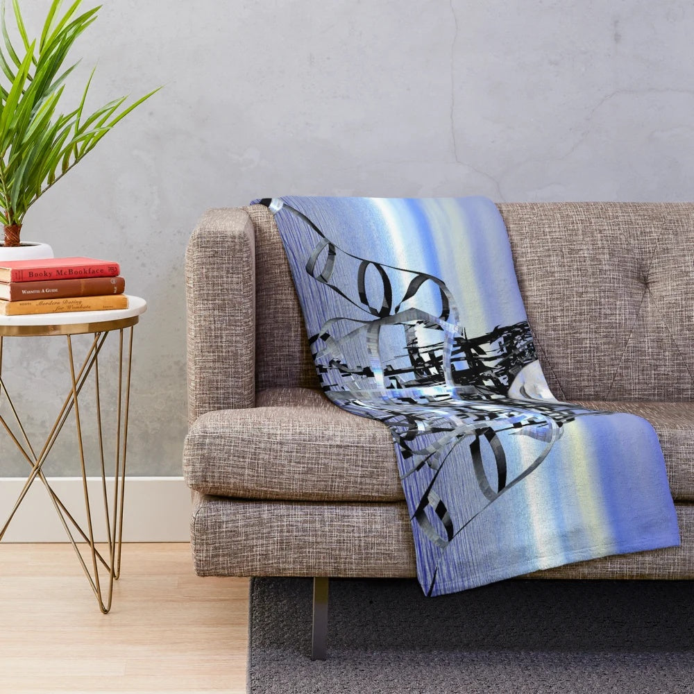 Plush blanket with a futuristic, cosmic design featuring robots, aliens, and psychedelic patterns