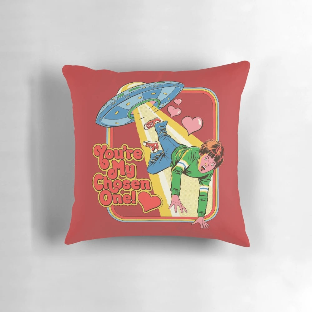 A retro-style pillow with a heart and sci-fi elements, perfect for Valentine's Day