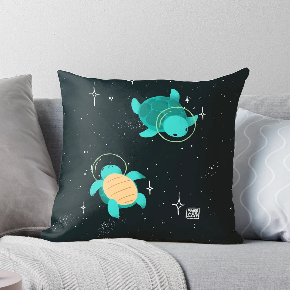 Colorful throw pillow featuring a cute, green turtle floating in space among stars and planets