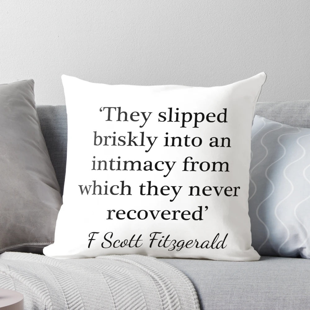 F. Scott Fitzgerald quote "They slipped briskly into an intimacy" printed on a decorative pillow