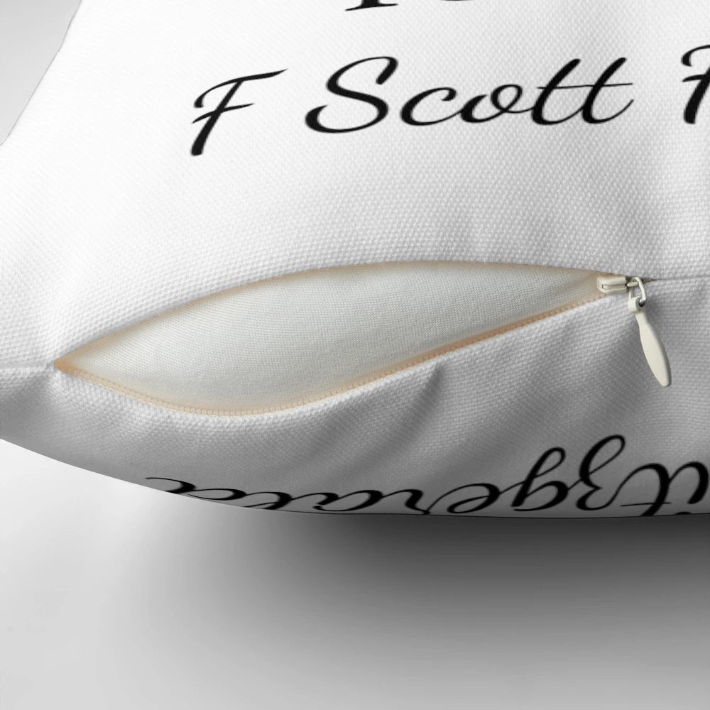 F. Scott Fitzgerald quote "They slipped briskly into an intimacy" printed on a decorative pillow