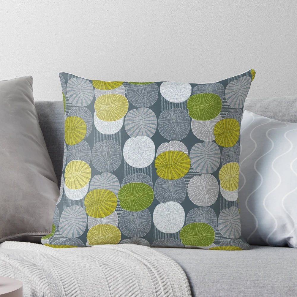 Lime-colored pillow featuring a fossil design inspired by the extinct Dickinsonia creature
