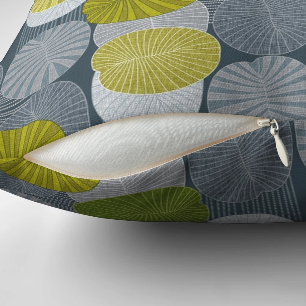 Lime-colored pillow featuring a fossil design inspired by the extinct Dickinsonia creature