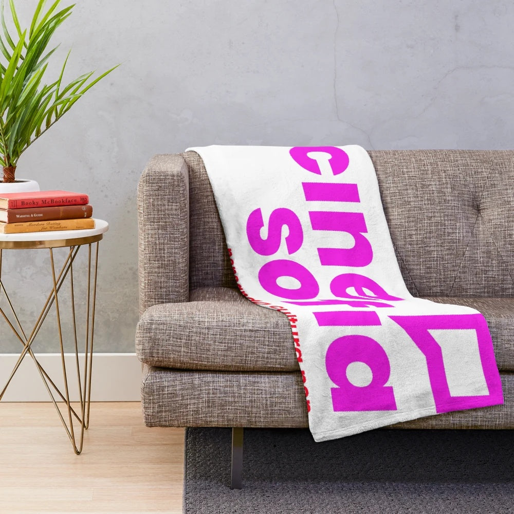 Plush blanket with geometric and nature-inspired patterns