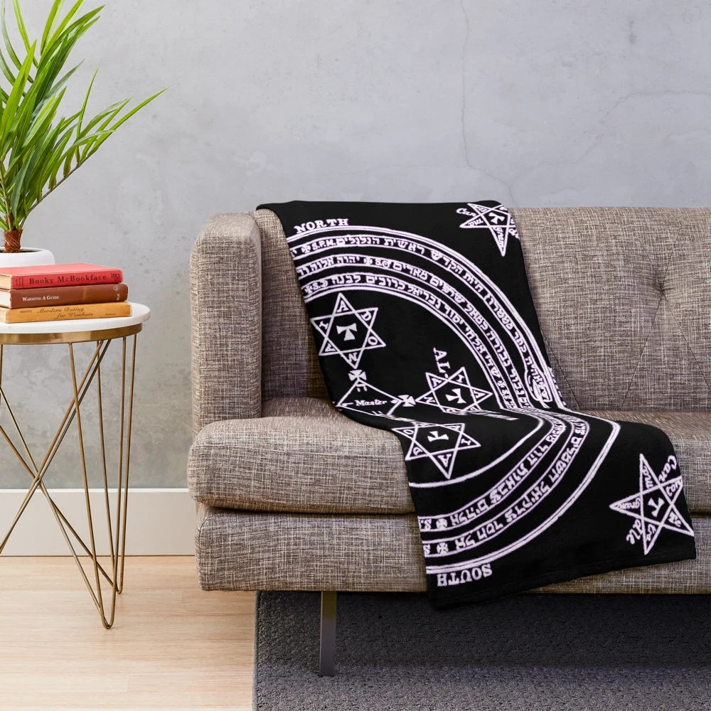 Inverted plush blanket featuring occult symbols and magical seals