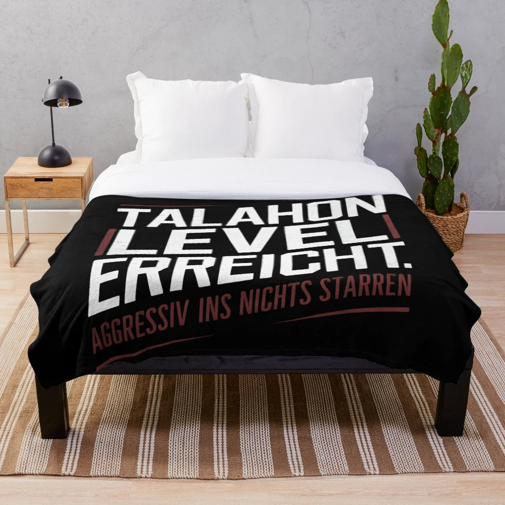 Ironic statement plush blanket featuring a Talahon-inspired design