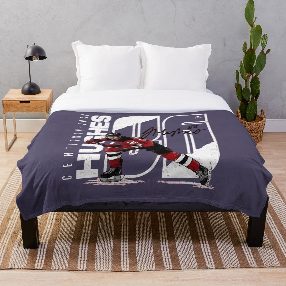 Jack Hughes hockey themed plush blanket with sweatshirt design