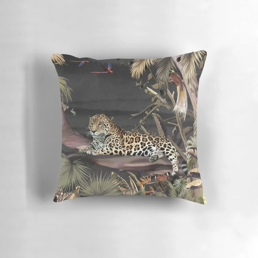 Jaguar animal in a tropical forest background pattern on a pillow