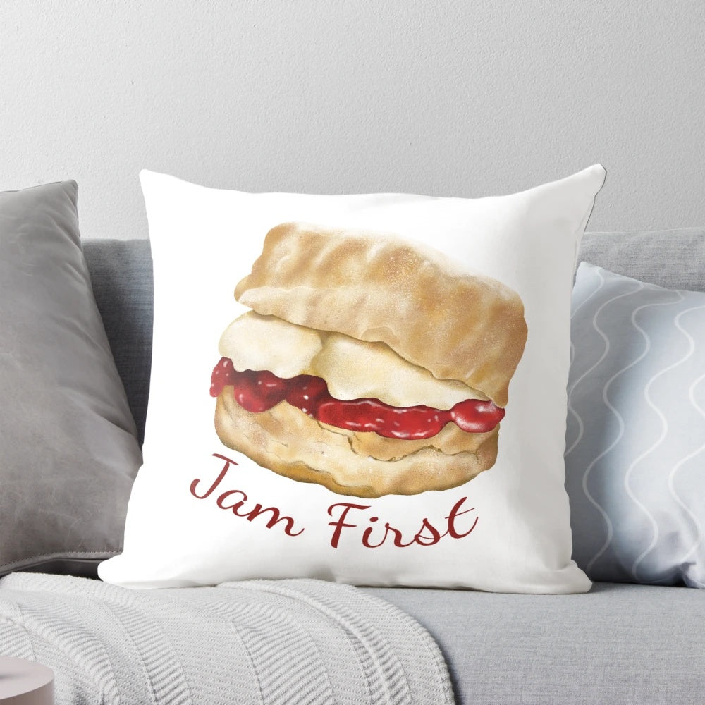 Jam First Scone Pillow, a cozy and delightful home accessory featuring a classic Cornish cream tea scone design.