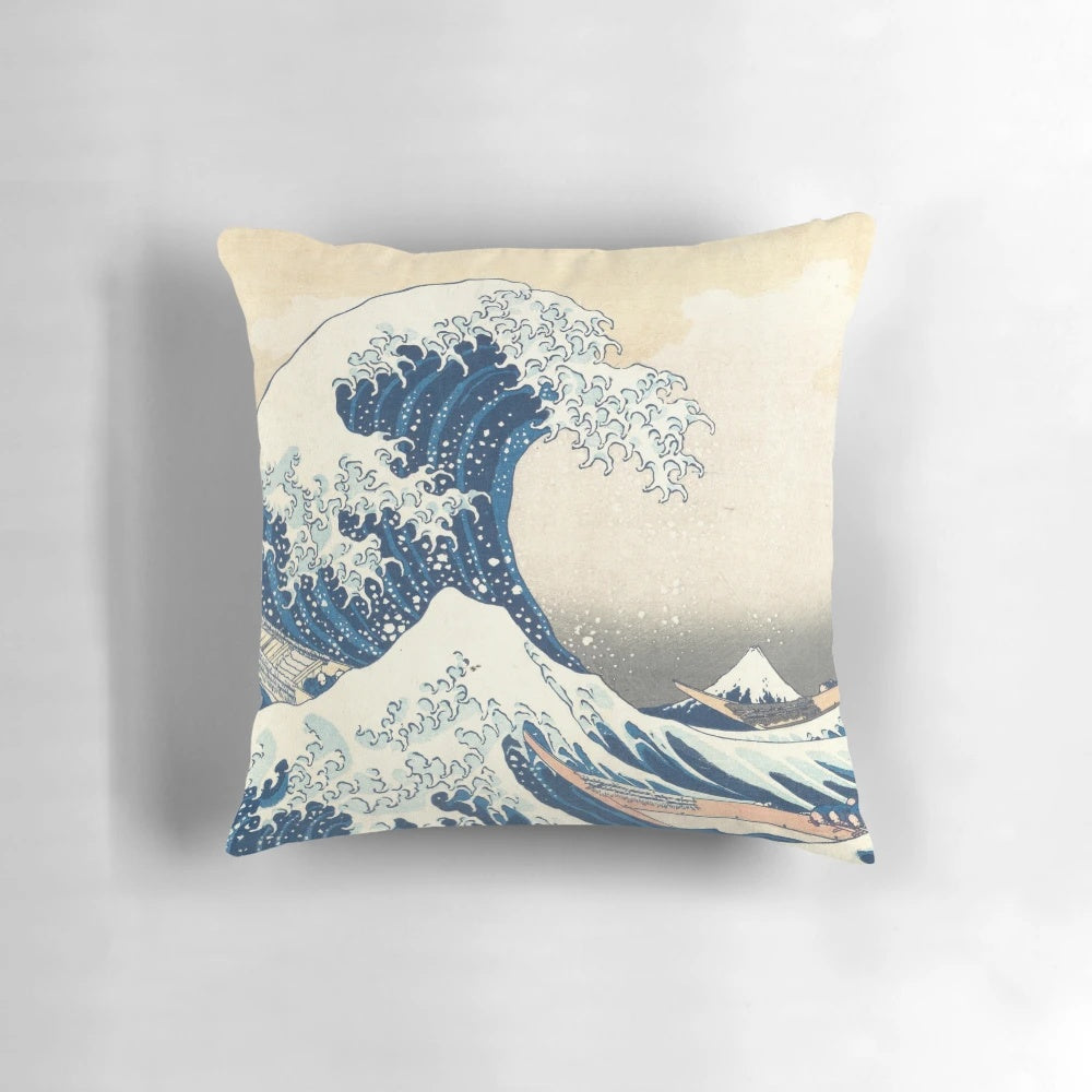 Decorative pillow featuring the iconic "Great Wave Off Kanagawa" woodblock print by the renowned Japanese artist Katsushika Hokusai.