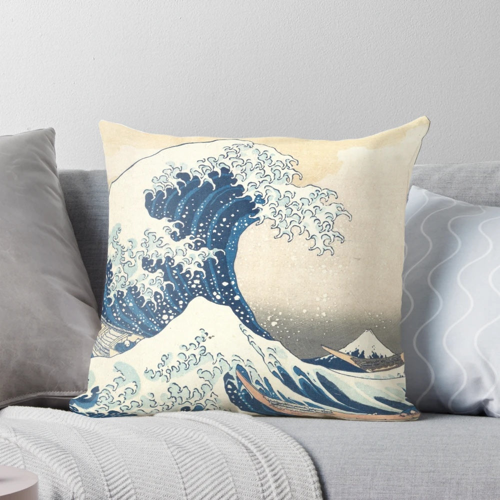 Decorative pillow featuring the iconic "Great Wave Off Kanagawa" woodblock print by the renowned Japanese artist Katsushika Hokusai.
