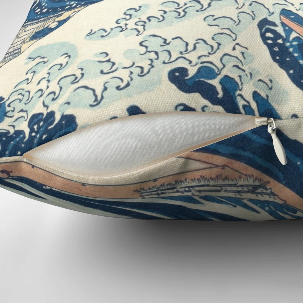 Decorative pillow featuring the iconic "Great Wave Off Kanagawa" woodblock print by the renowned Japanese artist Katsushika Hokusai.