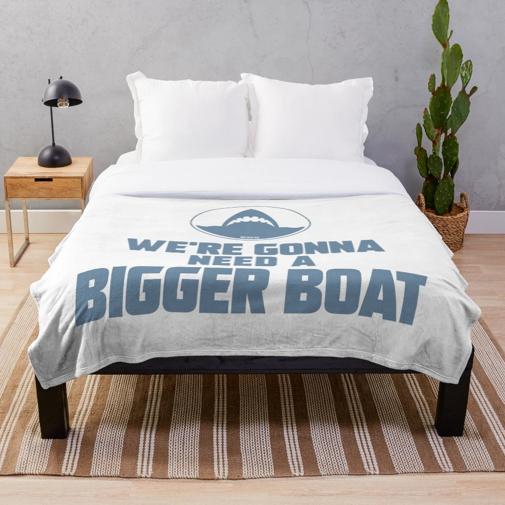 Jaws movie inspired plush blanket featuring iconic "We're Gonna Need a Bigger Boat" quote