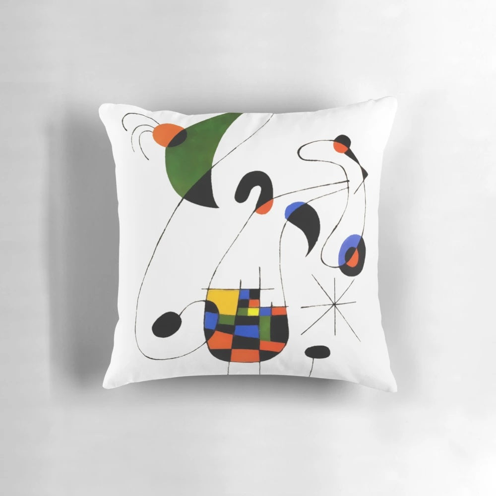 Decorative pillow featuring vibrant line art prints inspired by the famous Spanish painter Joan Miro