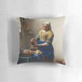 A decorative throw pillow featuring Johannes Vermeer's iconic painting "The Milkmaid" from the Dutch Golden Age.