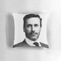 Pillow featuring a black and white portrait of actor Jon Hamm in a pointillist art style.