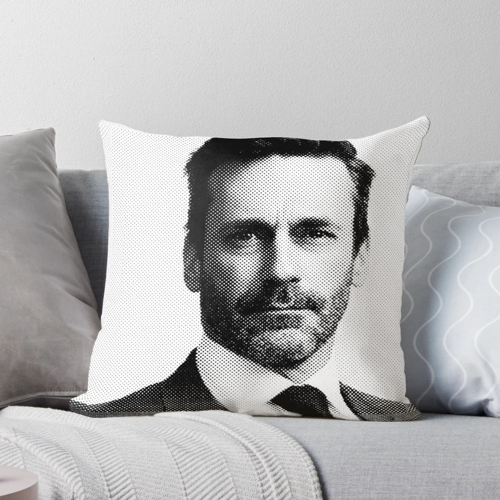 Pillow featuring a black and white portrait of actor Jon Hamm in a pointillist art style.