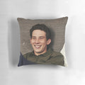 Josh O'Connor, star of "The Crown", depicted on a plush, comfortable pillow.