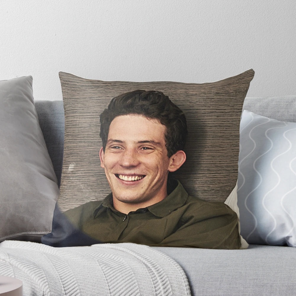 Josh O'Connor, star of "The Crown", depicted on a plush, comfortable pillow.