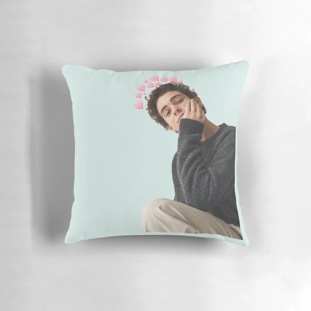 A cozy pillow featuring Joshua Bassett, the star of "High School Musical: The Musical: The Series"