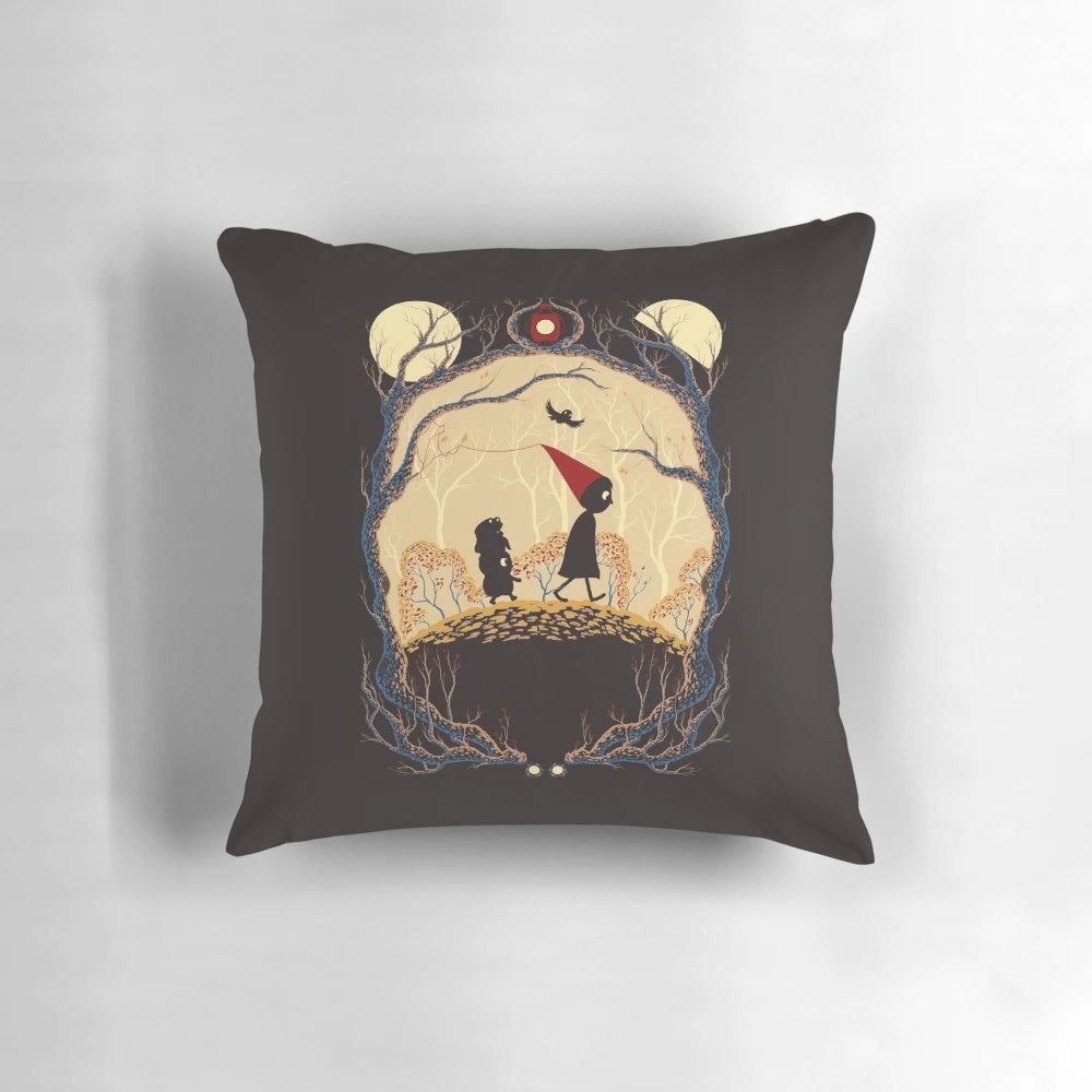 A cozy, over the garden wall-inspired journey pillow featuring a whimsical design with a moon, lantern, and forest elements.