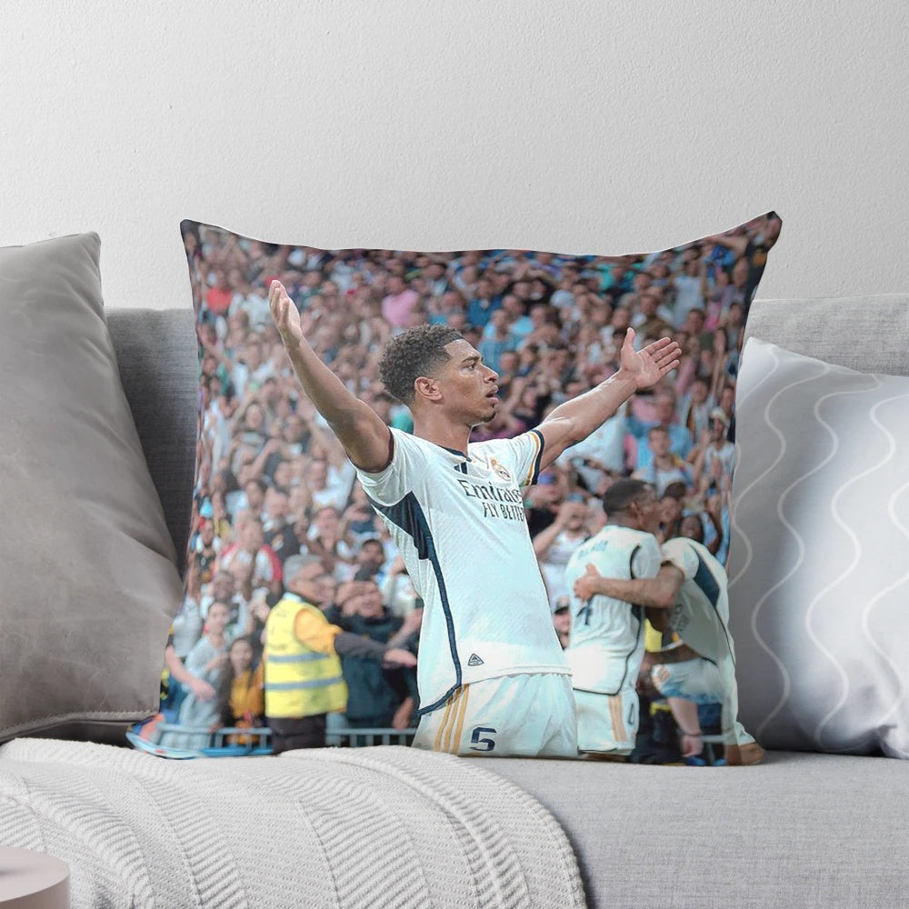 A decorative pillow featuring artwork of Jude Bellingham, the talented young footballer playing for Real Madrid.