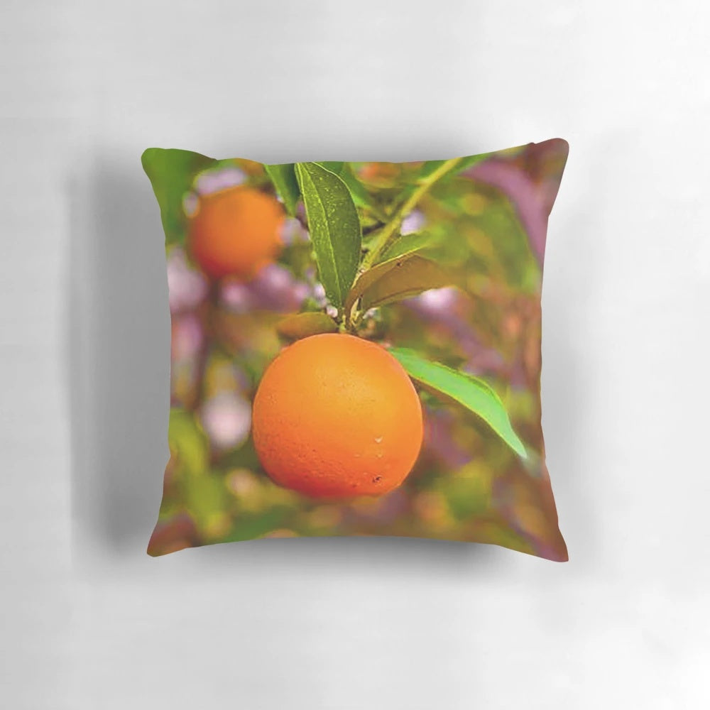 Cozy orange throw pillow featuring juicy, ripe oranges