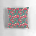 Vibrant pomegranate fruits printed on a plush decorative pillow