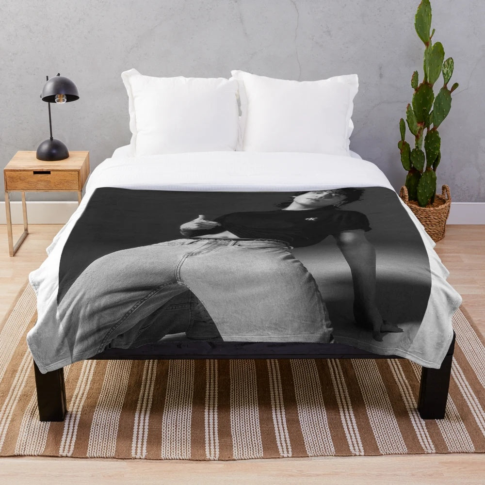 Jungkook plush blanket featuring the BTS member in a stylish photoshoot