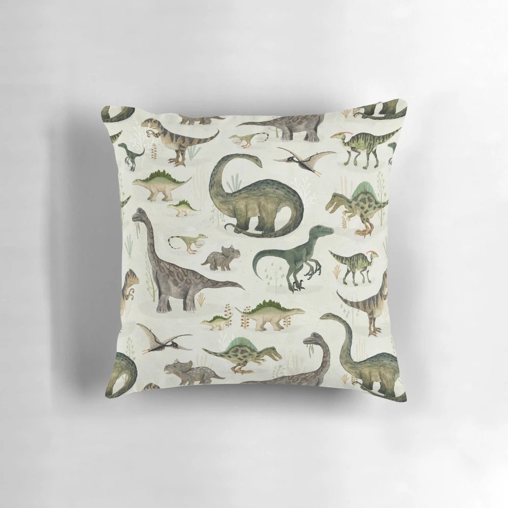 Soft and cozy Jurassic dinosaur pillow in shades of green and gray, perfect for boys' bedroom or living room decor.