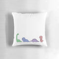 Colorful cartoon dinosaurs including brachiosaurus, T-rex, stegosaurus, and triceratops printed on a soft, comfortable pillow.
