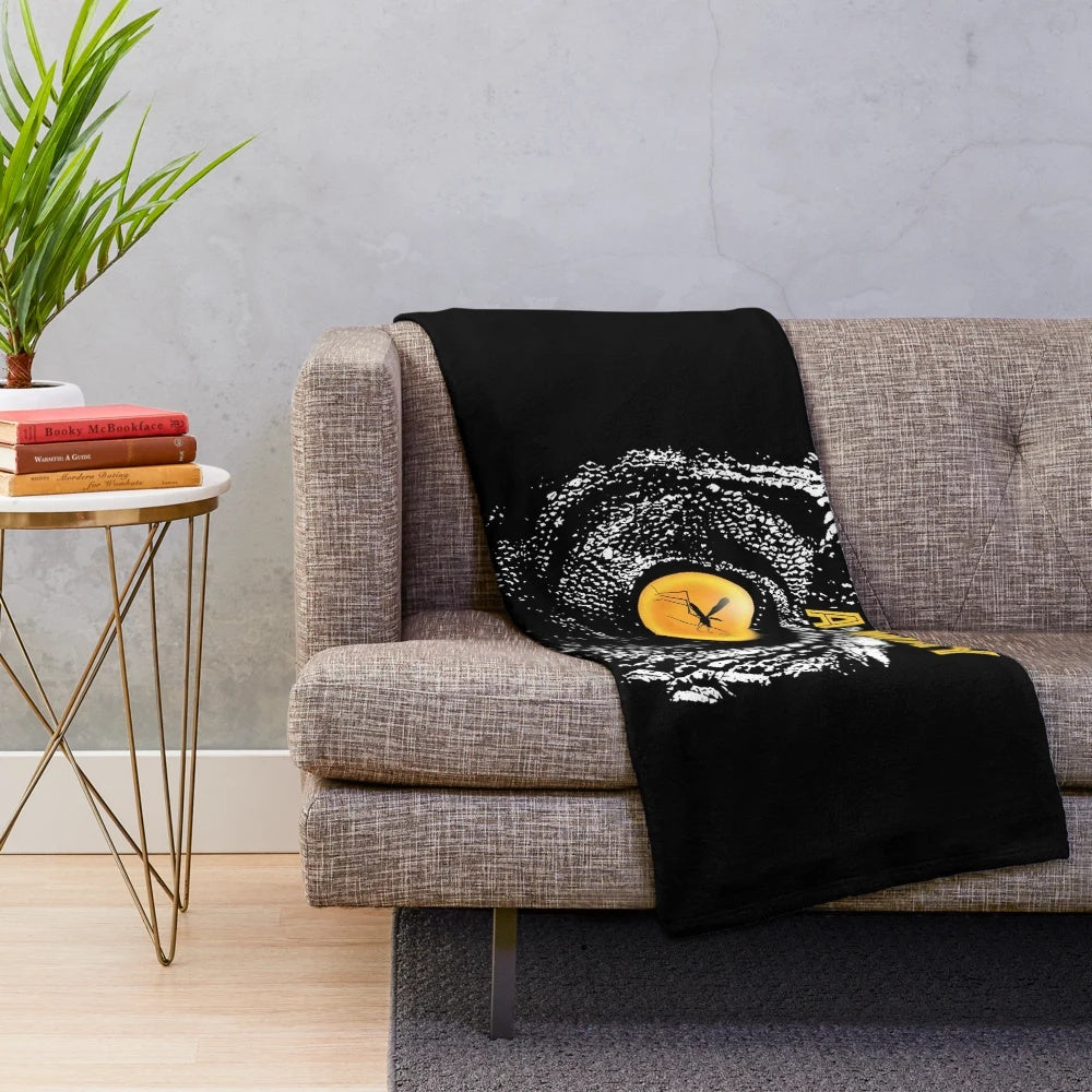 Jurassic Park inspired plush blanket featuring the iconic "Life Finds A Way" quote
