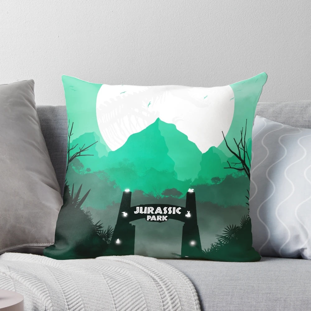 Plush throw pillow featuring iconic Jurassic Park dinosaurs and characters