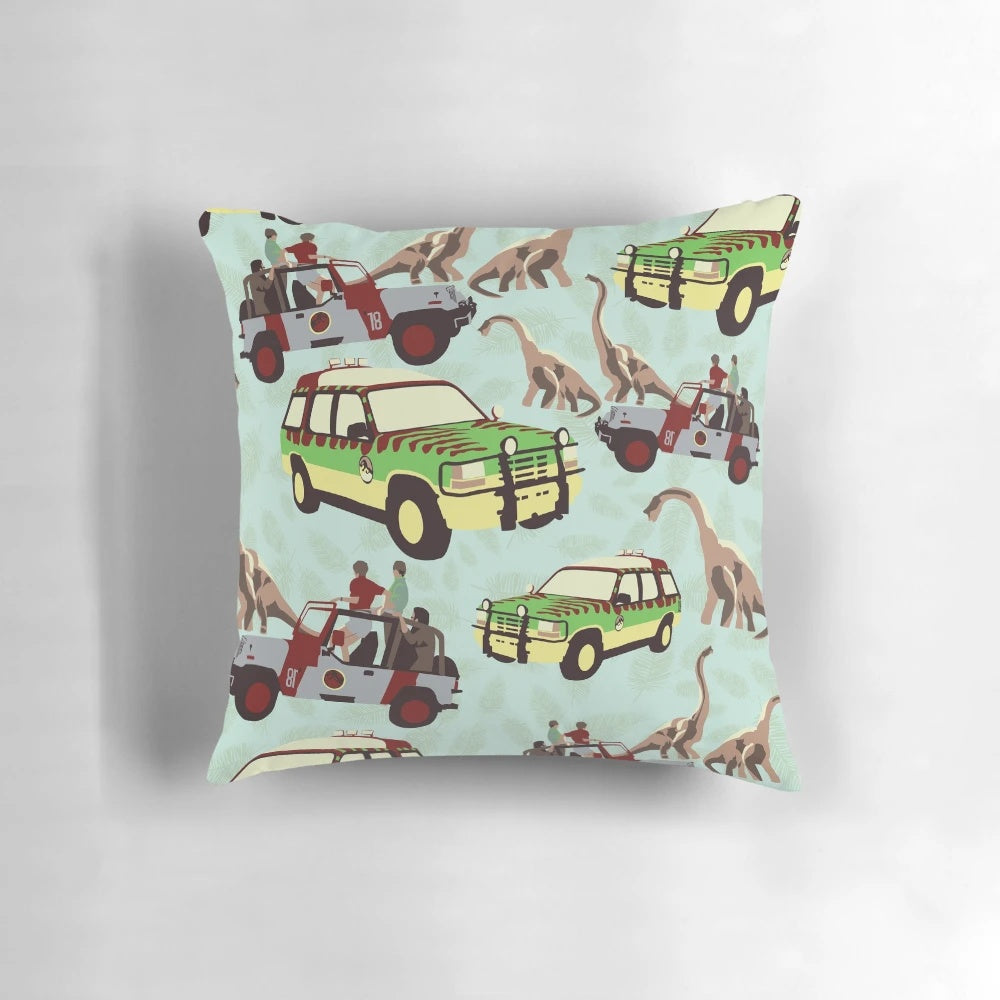 Vibrant, dinosaur-themed Jurassic Ride pillow with jeep and brachiosaurus design