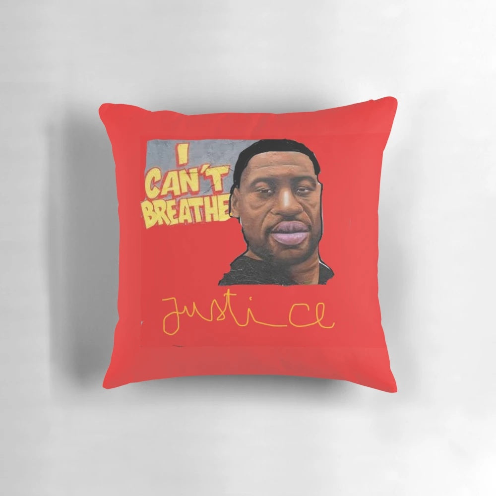 A memorial pillow with the text "#GEORGE FLOYD" in white text on a black background, honoring the legacy of George Floyd and the ongoing fight for racial justice.