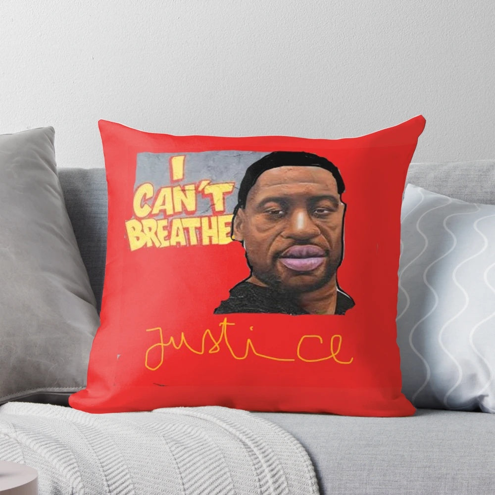 A memorial pillow with the text "#GEORGE FLOYD" in white text on a black background, honoring the legacy of George Floyd and the ongoing fight for racial justice.