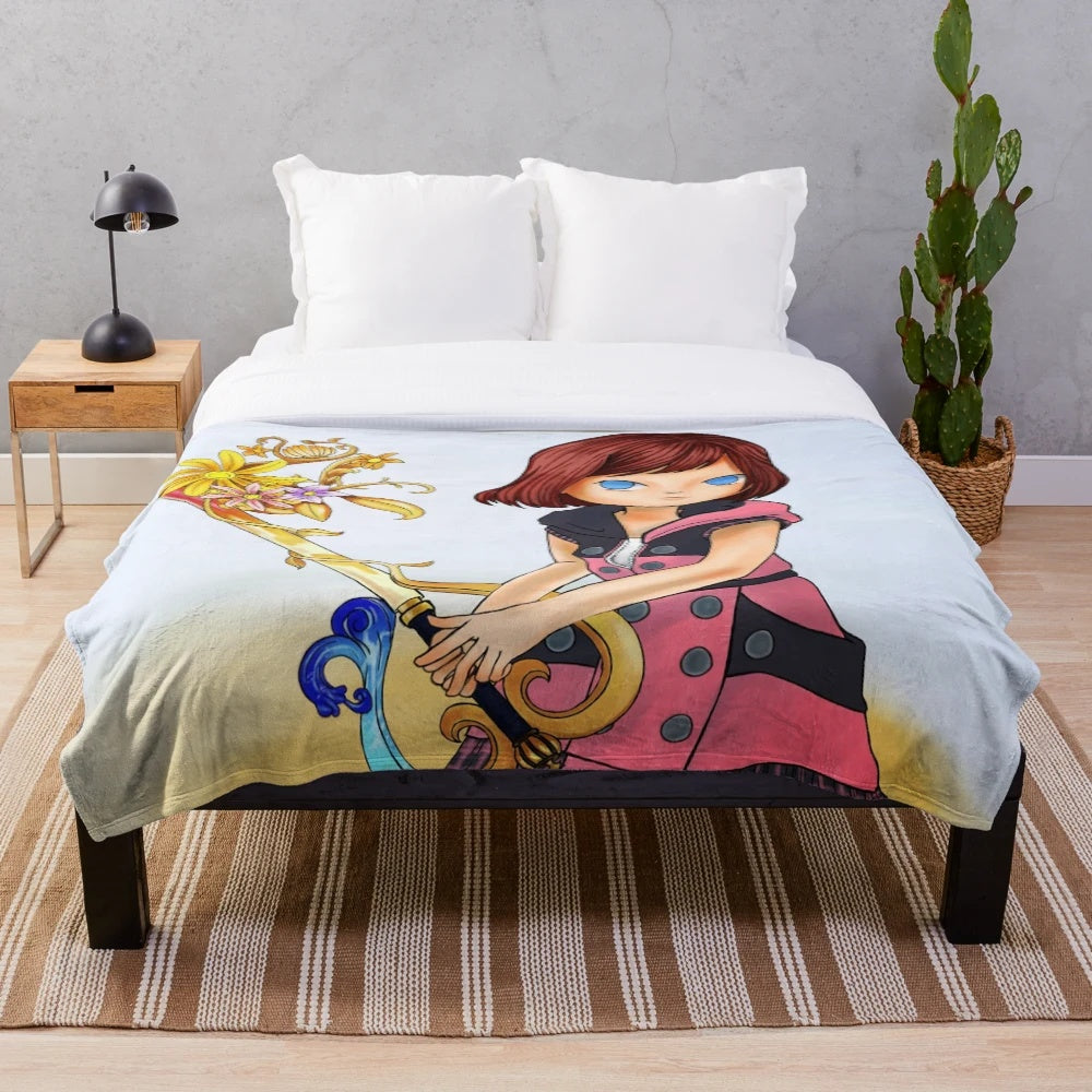 Kairi from Kingdom Hearts with Destiny's Embrace Keyblade in chibi style on a plush blanket
