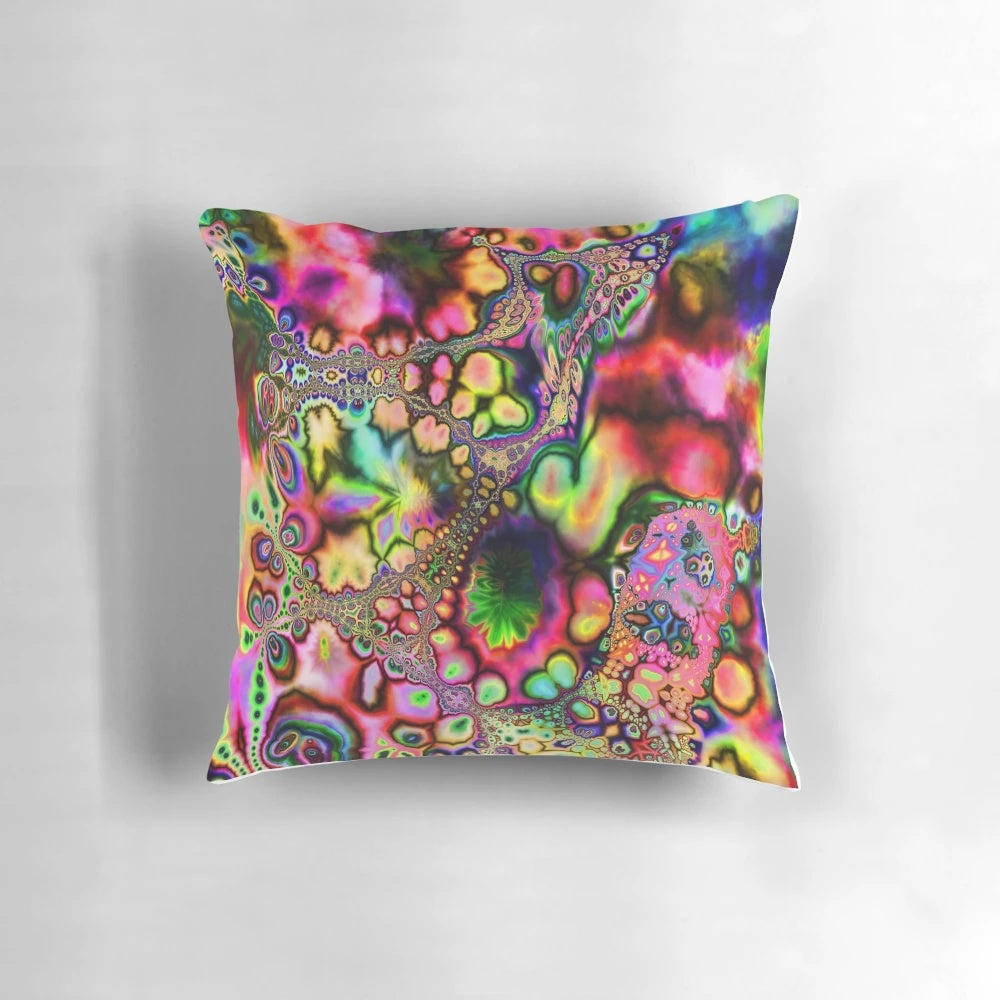 Vibrant, psychedelic pillow featuring a kaleidoscopic fractal art design