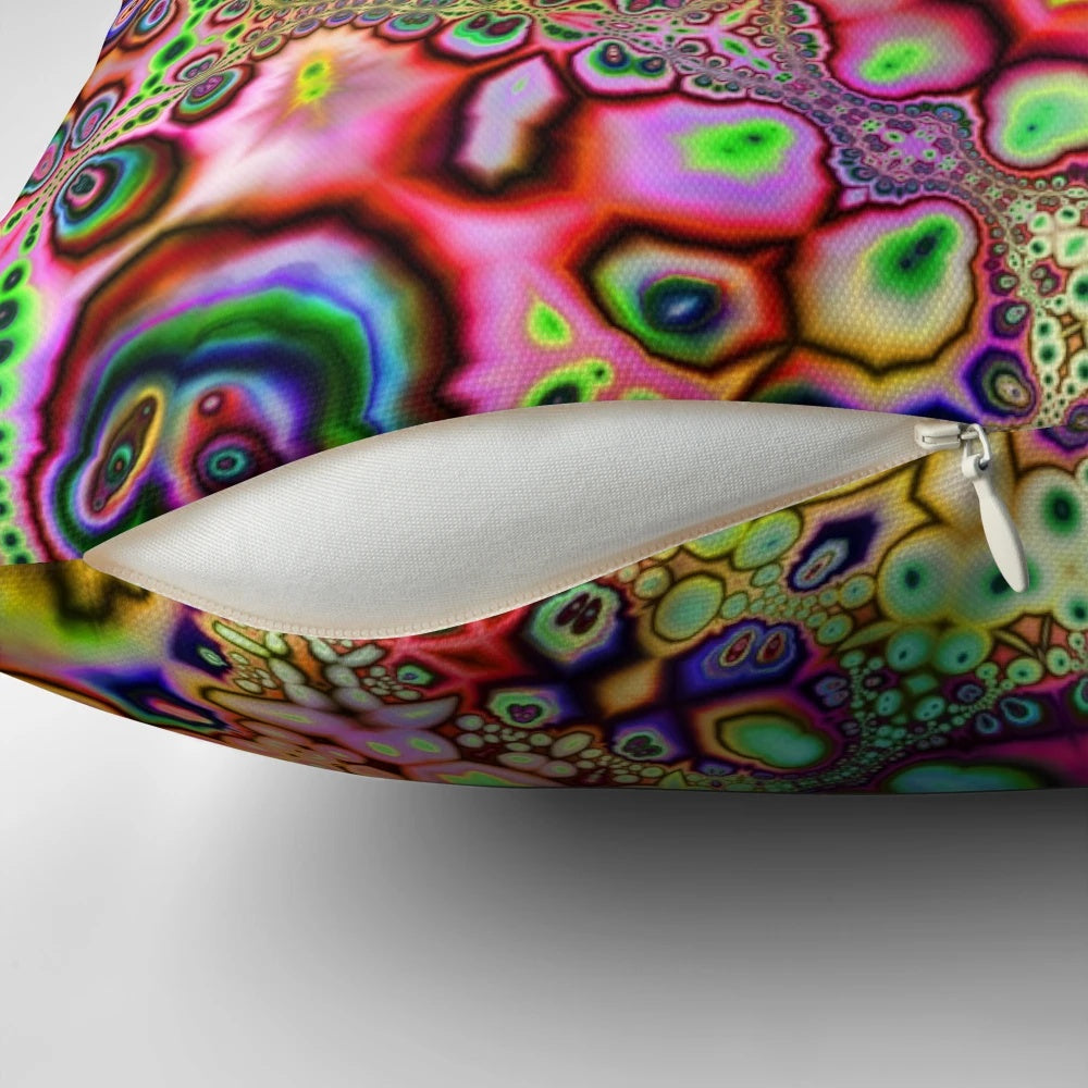 Vibrant, psychedelic pillow featuring a kaleidoscopic fractal art design