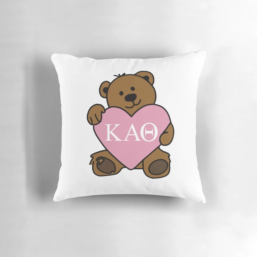 Soft plush Kappa Alpha Theta teddy bear pillow with sorority letters and heart design