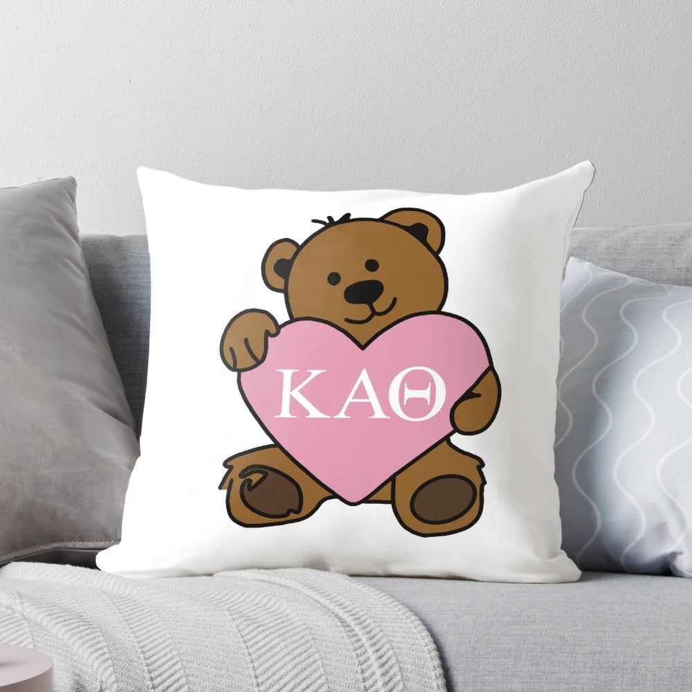Soft plush Kappa Alpha Theta teddy bear pillow with sorority letters and heart design