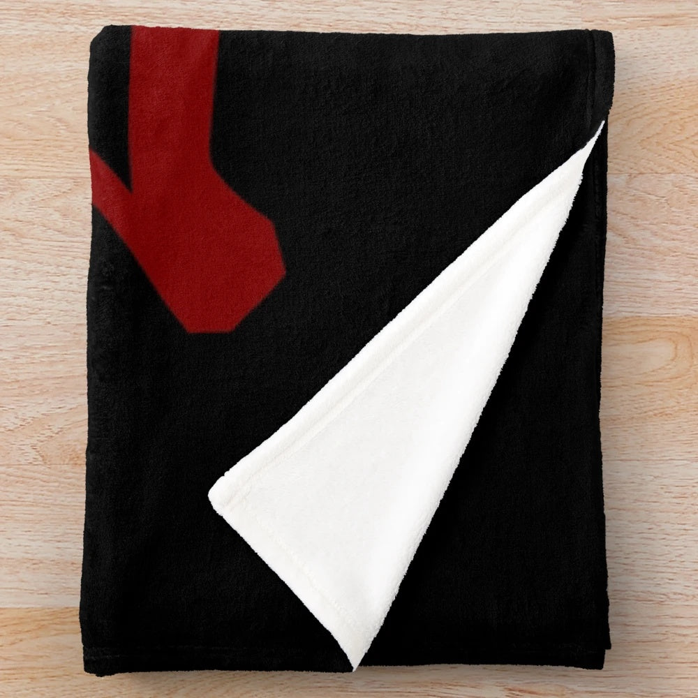 Karate-inspired plush blanket with karateka, chop, and colored belt imagery