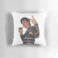 Decorative pillow featuring a peace sign design and the Kardashian family name