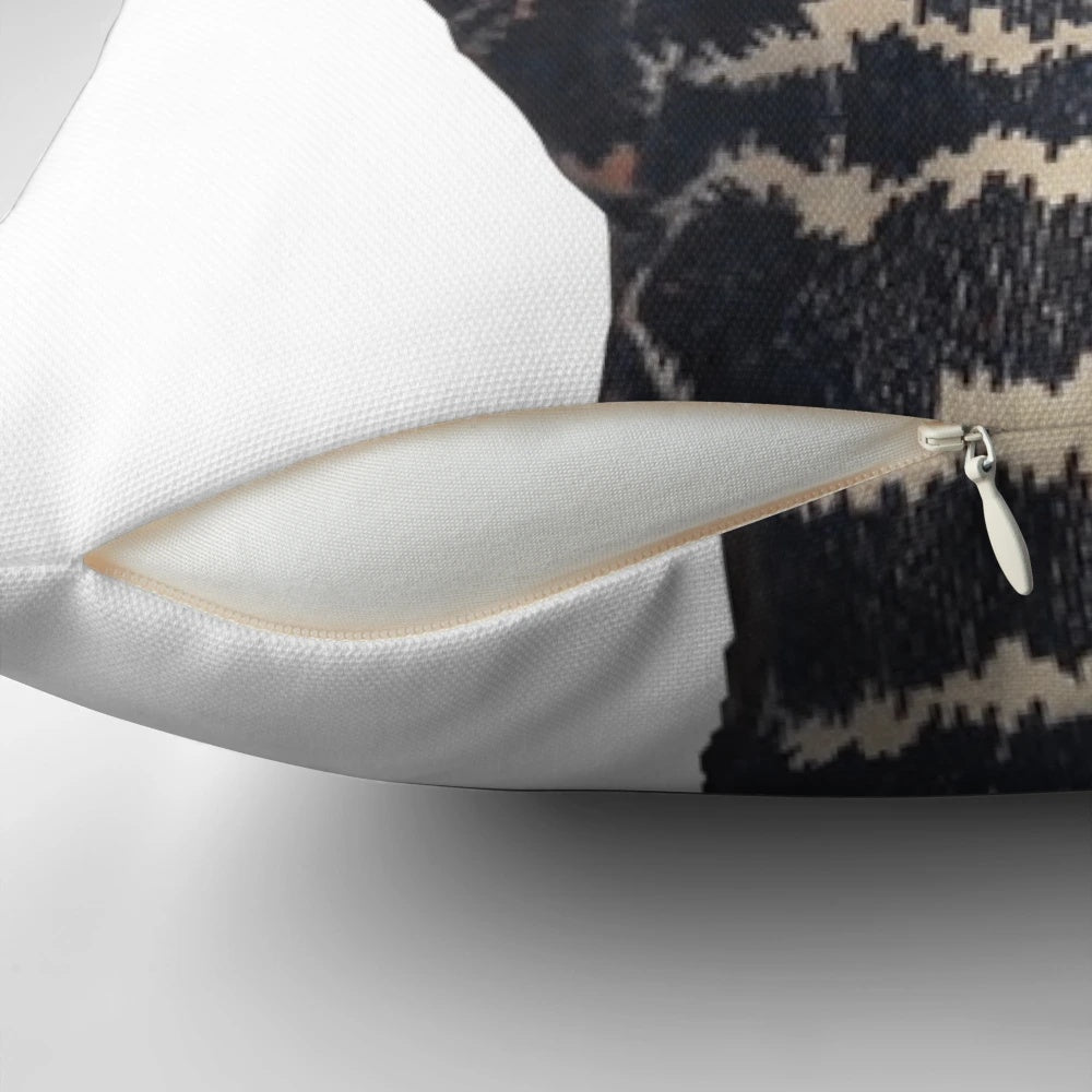 Decorative pillow featuring a peace sign design and the Kardashian family name